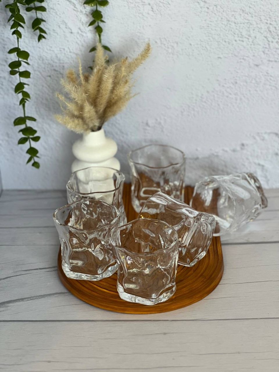 نیم لیوان دفرمه شیشه‌ای شفاف
