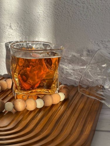 نیم لیوان دفرمه شیشه ای شفاف